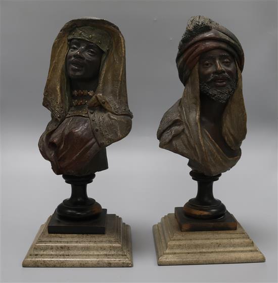 A pair of Austrian terracotta cold painted busts of Moors, overall 13.5in.